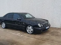 Usado Mercedes E55 AMG AMG 354 CV (260 kW) 1998 Negro Berlina