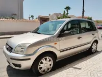 Usado Ford Fusion Trend 80 CV (58 kW) 2004 Gris / plata Utilitario