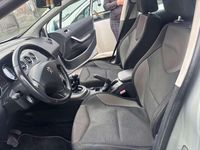 Usado Peugeot 308 Sportium 92 CV (67 kW) 2010 Plateado Utilitario
