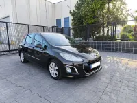 Usado Peugeot 308 Active 112 CV (82 kW) 2012 Marrón Berlina