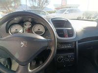 Usado Peugeot 207 75 CV (55 kW) 2007 Naranja Utilitario