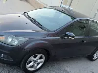 Usado Ford Focus Titanium 109 CV (80 kW) 2010 Gris / plata Berlina