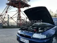 Usado Opel Astra 115 CV (84 kW) 1992 Azul Berlina