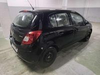 Usado Opel Corsa 75 CV (55 kW) 2010 Negro Utilitario