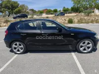 Usado BMW 118 122 CV (89 kW) 2006 Negro Utilitario