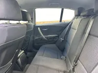 Usado BMW 116 122 CV (89 kW) 2009 Negro Utilitario