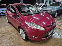 Usado Ford Fiesta Ghia 90 CV (66 kW) 2008 Granate Utilitario