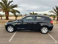 Usado BMW 116 122 CV (89 kW) 2009 Negro Utilitario