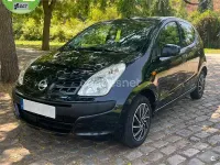 Usado Nissan Pixo Acenta 68 CV (50 kW) 2010 Negro Utilitario