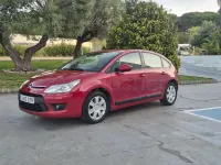Usado Citroën C4 88 CV (64 kW) 2010 Granate Berlina