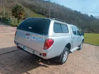 Usado Mitsubishi L200 136 CV (100 kW) 2013 Gris / plata Pickup/Camioneta