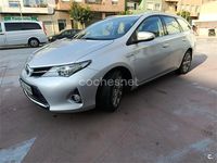 Usado Toyota Auris Hybrid Advance 136 CV (100 kW) 2014 Gris / plata Familiar
