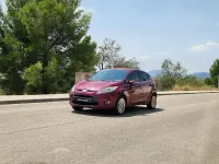 Usado Ford Fiesta Titanium 90 CV (66 kW) 2008 Granate Utilitario