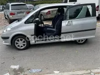 Usado Peugeot 1007 75 CV (55 kW) 2006 Gris / plata Monovolumen