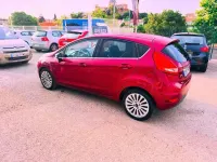 Usado Ford Fiesta Titanium 90 CV (66 kW) 2009 Rojo Utilitario