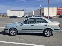 Usado Nissan Almera 110 CV (80 kW) 2001 Verde Berlina
