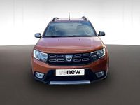Usado Dacia Sandero 90 CV (66 kW) 2017 Naranja Berlina