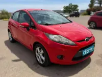 Usado Ford Fiesta Trend 82 CV (60 kW) 2011 Rojo Utilitario