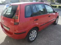 Usado Ford Fusion 100 CV (73 kW) 2003 Rojo Utilitario