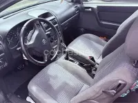 Usado Opel Astra Edition 100 CV (73 kW) 2003 Negro Berlina