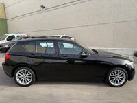 Usado BMW 118 Sport Line 170 CV (125 kW) 2012 Negro Utilitario