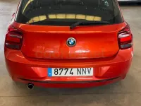 Usado BMW 116 Sport Line 136 CV (100 kW) 2012 Naranja Utilitario