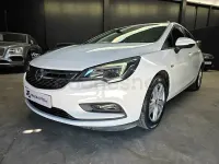 Używany Opel Astra Dynamic 110 KM (80 kW) 2019 Biały Sedan/Limuzyna