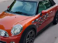 Usado Mini Cooper D 111 CV (81 kW) 2011 Naranja Utilitario