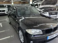 Usado BMW 118 122 CV (89 kW) 2005 Negro Utilitario