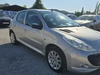 Usado Peugeot 206+ 68 CV (50 kW) 2010 Gris Utilitario