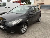 Usado Mazda 2 Active 68 CV (50 kW) 2009 Negro Utilitario