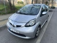 Usado Toyota Aygo 54 CV (39 kW) 2007 Gris / plata Utilitario