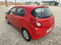Usado Opel Corsa Essentia 80 CV (58 kW) 2009 Rojo Utilitario