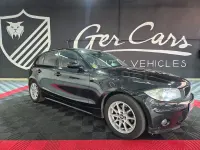 Usado BMW 118 122 CV (89 kW) 2006 Negro Utilitario