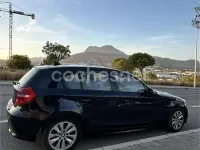 Usado BMW 118 122 CV (89 kW) 2007 Negro Utilitario