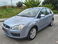 Używany Ford Focus Ghia 109 KM (80 kW) 2006 Niebieski Sedan/Limuzyna