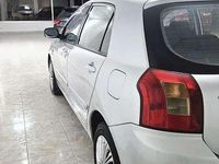Käytetty Toyota Corolla 97 HP (71 kW) 2003 Harmaa Viistoperä