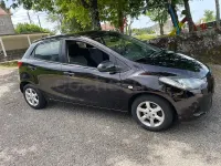 Usado Mazda 2 Active 68 CV (50 kW) 2008 Granate Utilitario