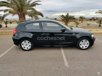 Usado BMW 116 122 CV (89 kW) 2009 Negro Utilitario
