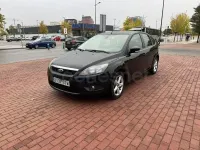 Usado Ford Focus Titanium 109 CV (80 kW) 2010 Negro Berlina