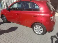 Używany Nissan Micra Acenta 80 KM (58 kW) 2011 Czerwony Hatchback