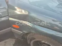 Usado Ford Escort 75 CV (55 kW) 1998 Verde Berlina