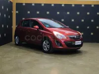 Usado Opel Corsa Selective 85 CV (62 kW) 2013 Granate Utilitario