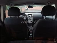 Usado Opel Corsa Cosmo 85 CV (62 kW) 2011 Granate Utilitario