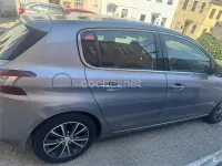 Usado Peugeot 308 Allure 125 CV (91 kW) 2014 Gris / plata Berlina