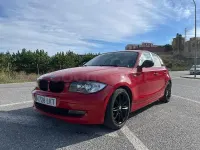 Usado BMW 116 115 CV (84 kW) 2010 Rojo Utilitario