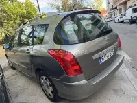 Usado Peugeot 308 SW 90 CV (66 kW) 2010 Gris / plata Familiar