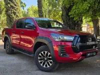 Usado Toyota HiLux Sport 204 CV (150 kW) 2024 Granate Pickup/Camioneta