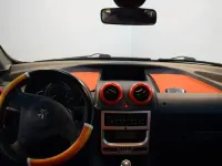 Usado Peugeot 1007 70 CV (51 kW) 2007 Rojo Monovolumen