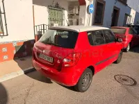 Usado Skoda Fabia 70 CV (51 kW) 2010 Rojo Berlina